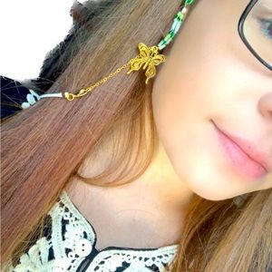 Eyeglass chain, green glass bearing and butterfly charms